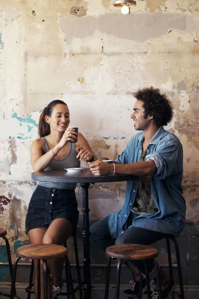 Resident couple at a coffee bar near Ironwood at Happy Valley in Phoenix, Arizona