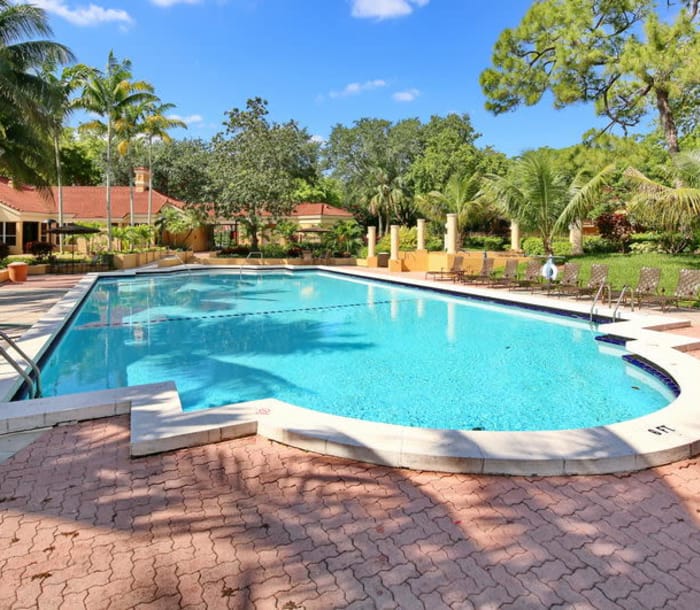 Swimming pool area at IMT Pinebrook Pointe in Margate, FL