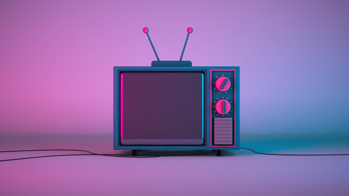 Old-school TV with pink/blue lighting