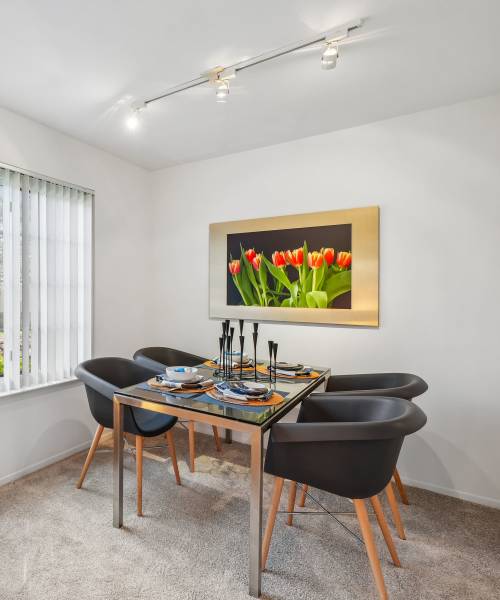 Dining table in an apartment home at Saddle Creek Apartments in Novi, Michigan