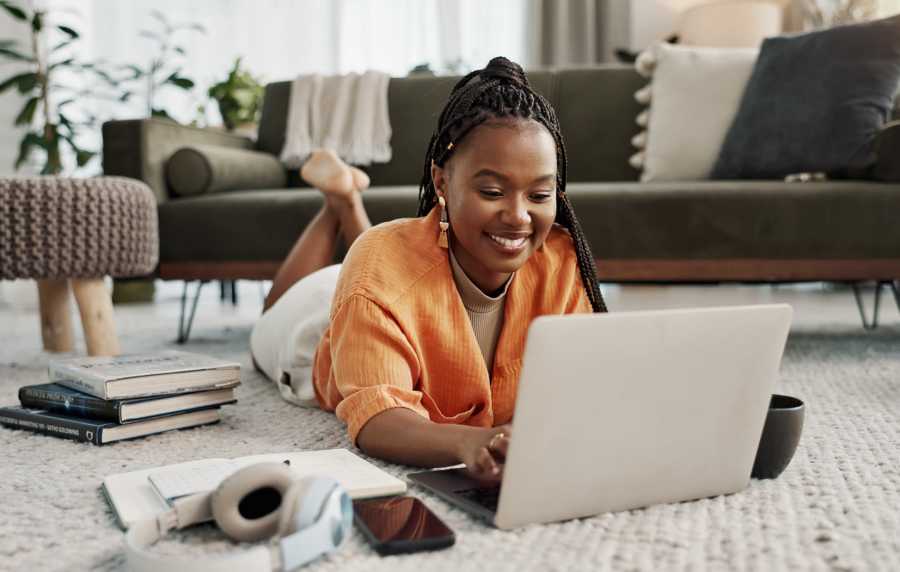 Resident working in her apartment at Seapointe Villas in Costa Mesa, California