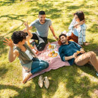 Resident friends in the park at Mount Hope Lofts in Rochester, New York
