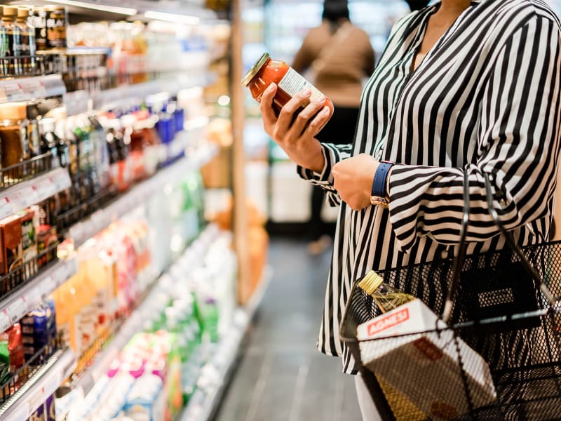 A woman shopping for groceries in a store near Stonecreek Club in Germantown, Maryland