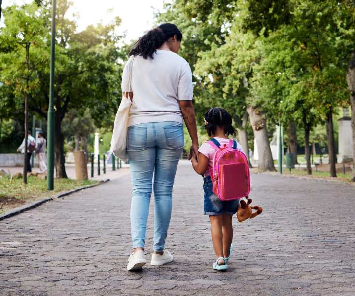 Resident picking her daughter from the school near Valencia Park in Orlando, Florida