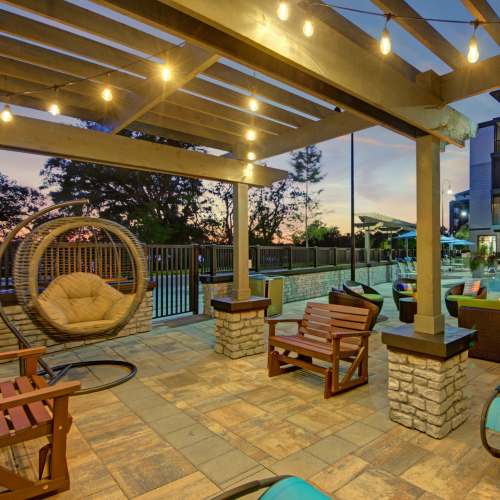 Outdoor lounge seating area at The Courtney at Lake Shadow in Orlando, Florida