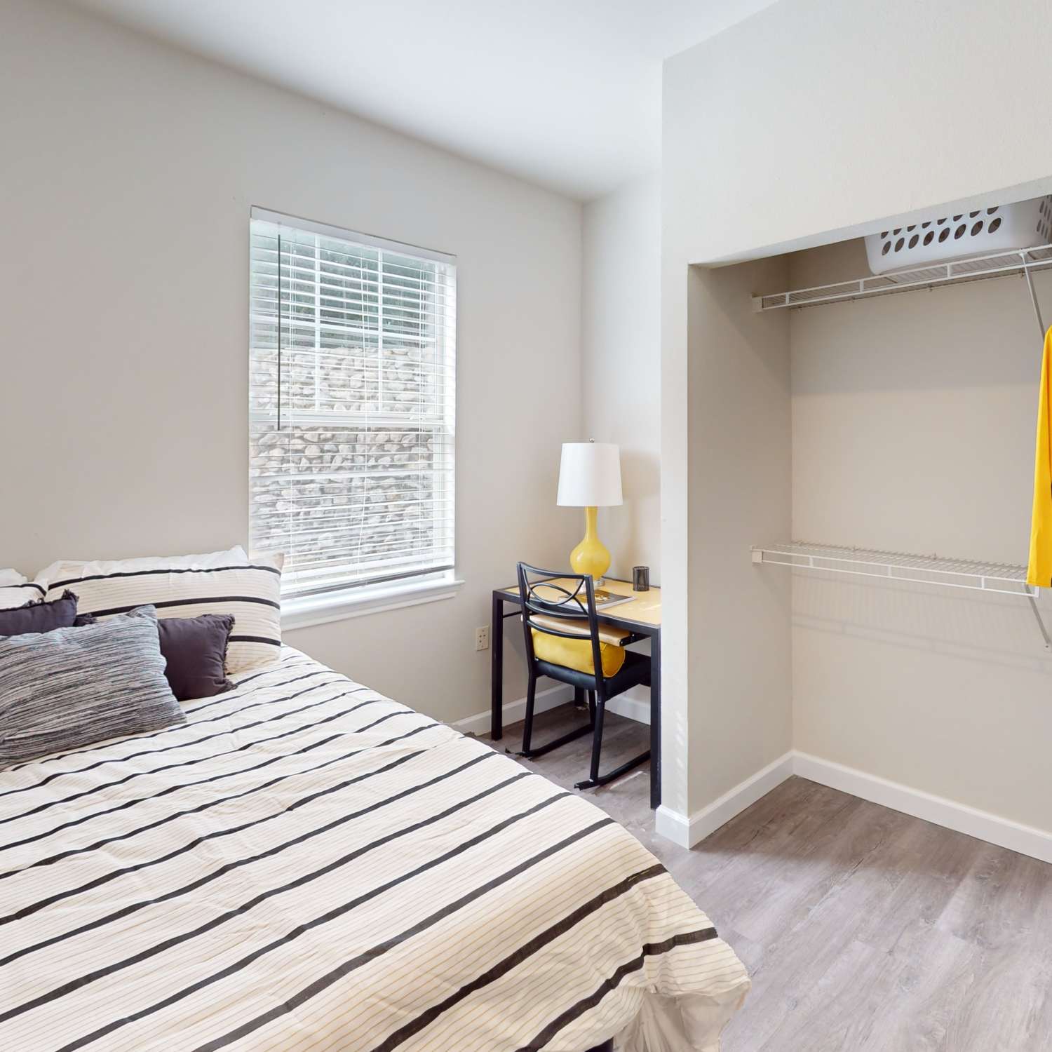 Bedroom with closet at The Quarters at Columbia in Columbia, Missouri