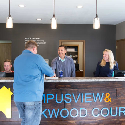 Staff greeting a prospect  at Campus View & Kirkwood Court in Cedar Rapids, Iowa