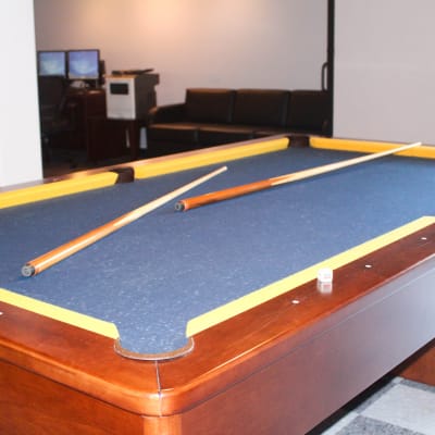 A pool table in the resident lounge at Seal Beach Officer Housing in Seal Beach, California