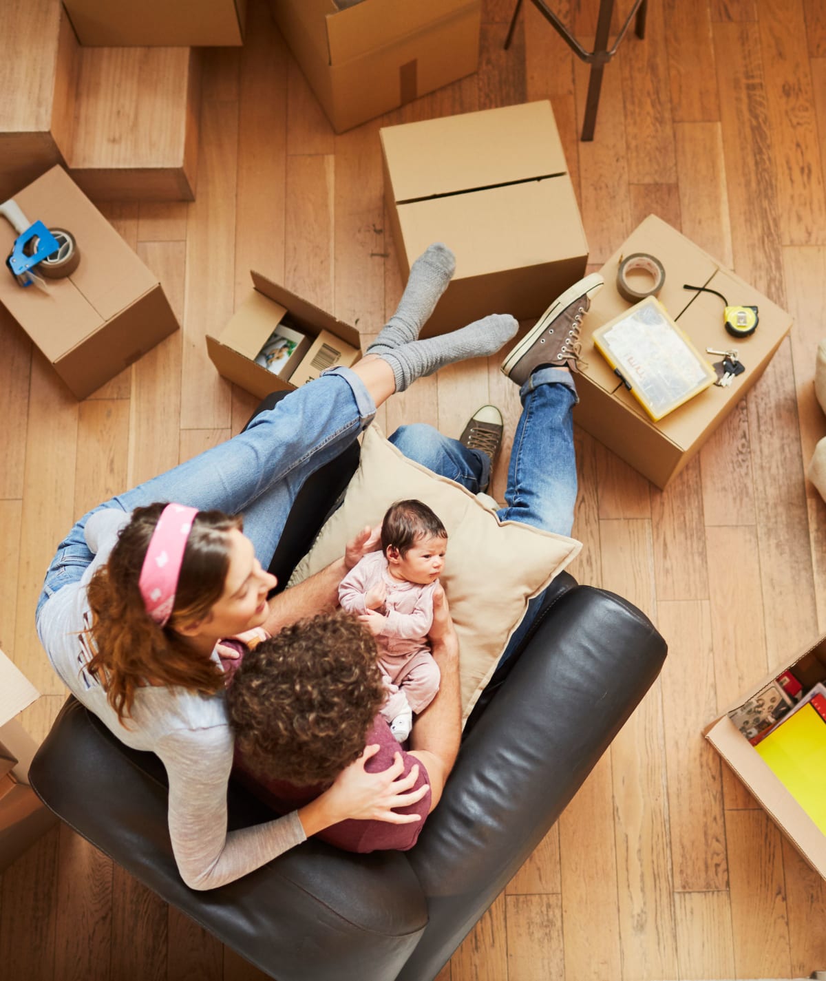 a family unpacking their moving boxes at American Self Storage – Clayton Downtown in Clayton, North Carolina
