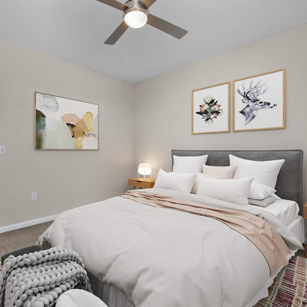 Bedroom with a ceiling fan at Citrine at Lake St. Louis in Lake Saint Louis, Missouri