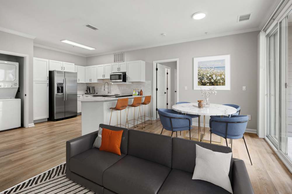 Newly renovated kitchen and living room with in home washer & dryer. Elegantly furnished at Briargate on Main in Parker, Colorado