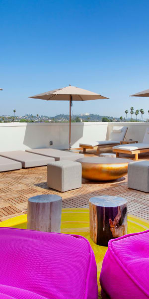 Roof top lounge for sunbathing at Brio Apartment Homes in Glendale, California
