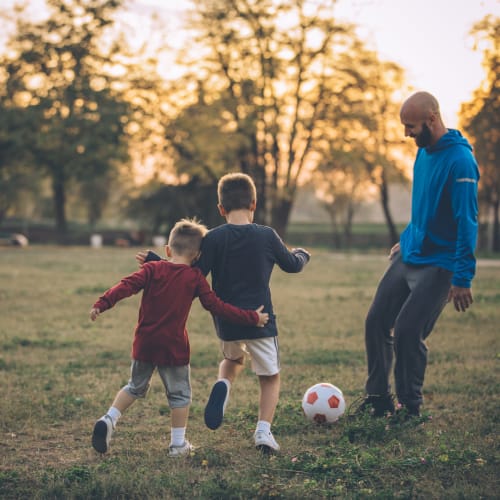 Kids playing soccer in park near Carpenter Park in Patuxent River, Maryland