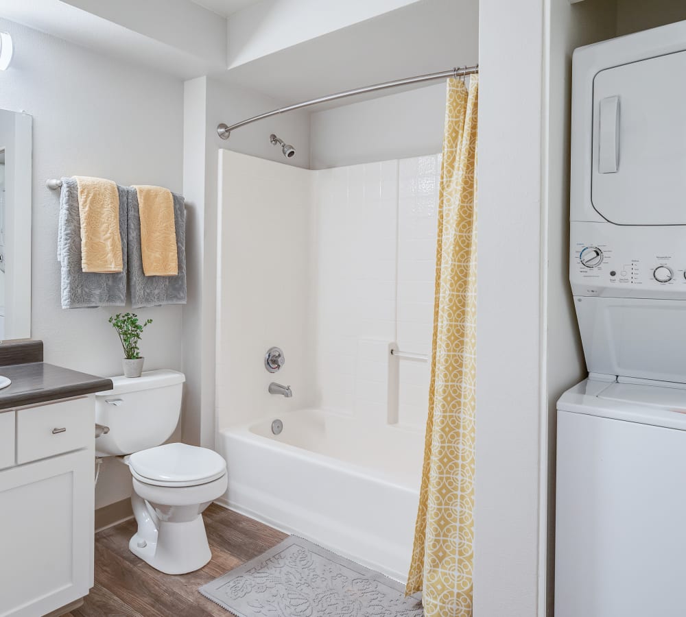 Master bathroom with a closet in upgraded unit at Altamont Summit in Happy Valley, Oregon 