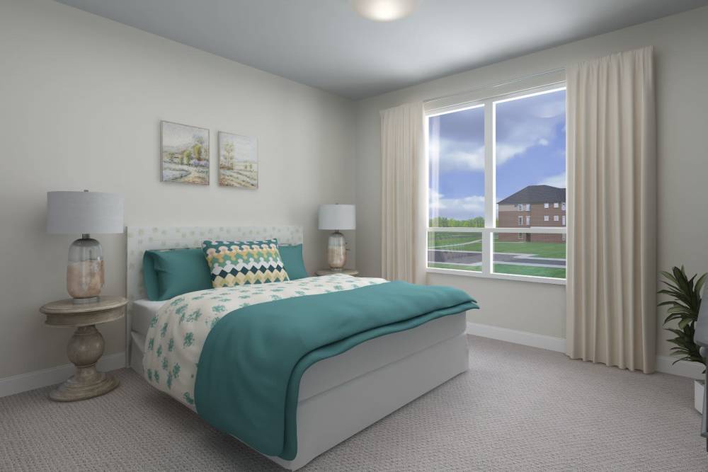 Bedroom with large comfortable bed at Harmony at Tucker Station in Louisville, Kentucky