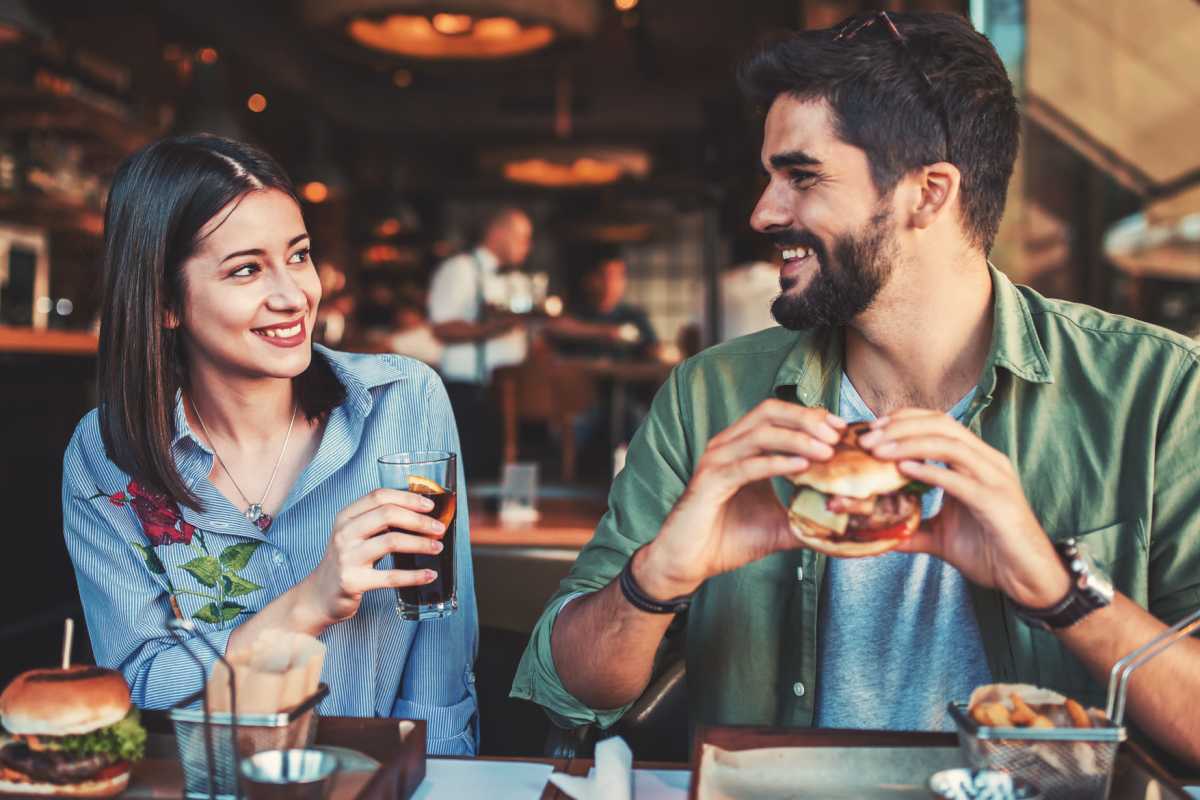 A resident couple enjoy a meal at their favorite spot near Villas At Bunker Hill, Houston, Texas