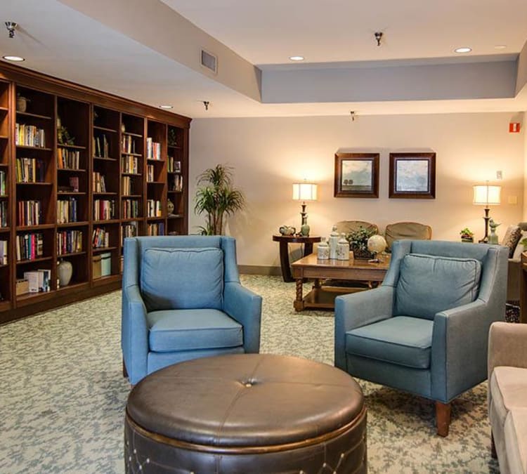 Quaint library with comfortable seating at The Commons at Woodland Hills in Woodland Hills, California