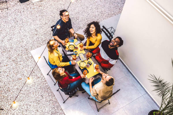 A group of friends at a restaurant near Commons at Briarwood Park in Brookhaven, Georgia