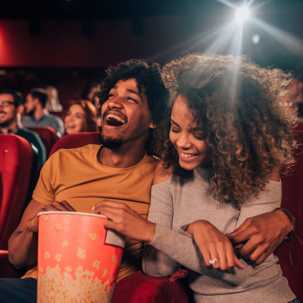 Residents enjoying a movie in their local neighborhood near The Residences at NEWCITY in Chicago, Illinois