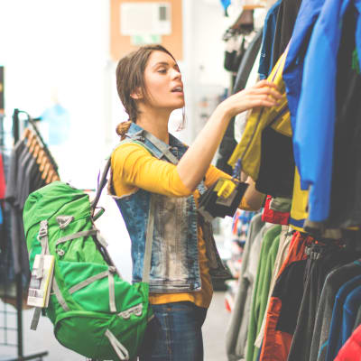 A resident shopping in a clothing store near Discovery Village in Joint Base Lewis McChord, Washington