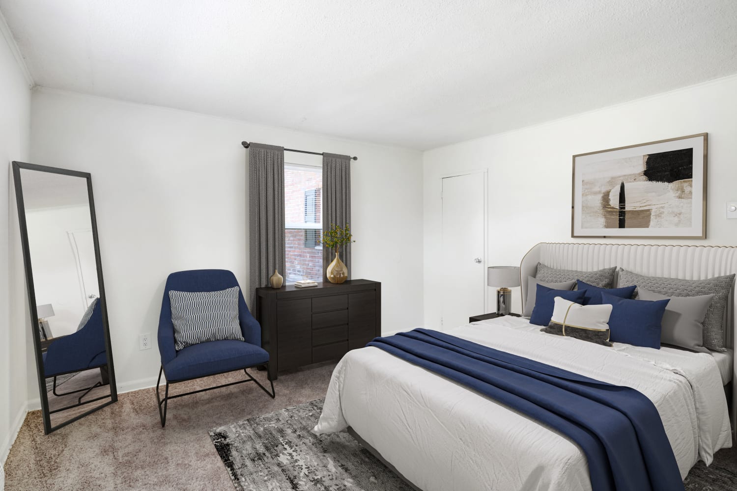Bedroom with plush carpeting at Eatoncrest Apartment Homes in Eatontown, New Jersey