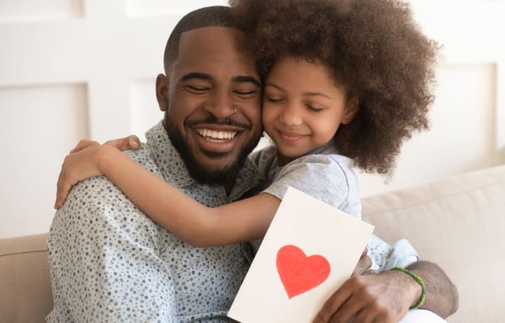 Father and daughter at {{location_name}}