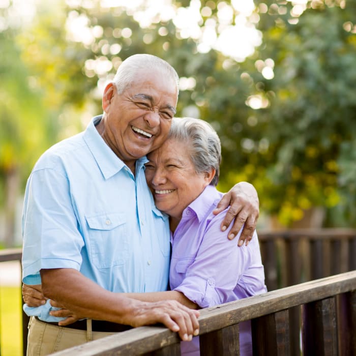Couple embracing at Sunny Days Assisted Living in Hollywood, Florida