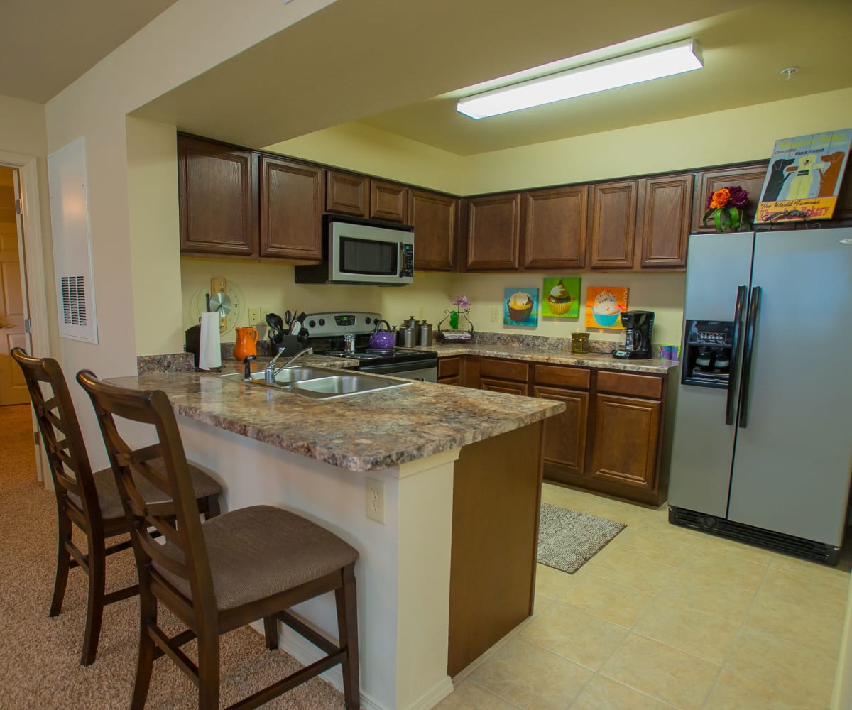 Kitchen at Coffee Creek Apartments in Owasso, Oklahoma