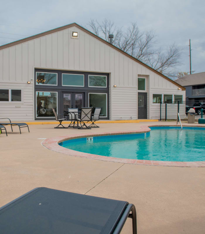 Outdoor swimming pool at Apple Creek Apartments in Stillwater, Oklahoma