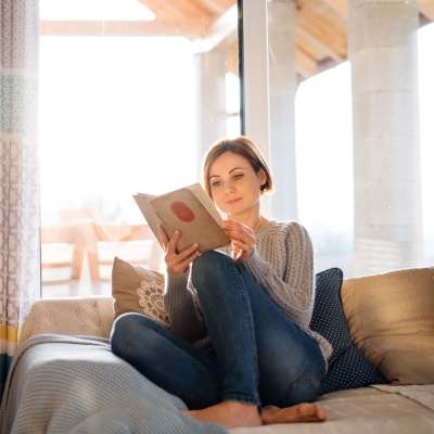 Woman relaxing at her home at Jade at North Hyde Park in Tampa, Florida