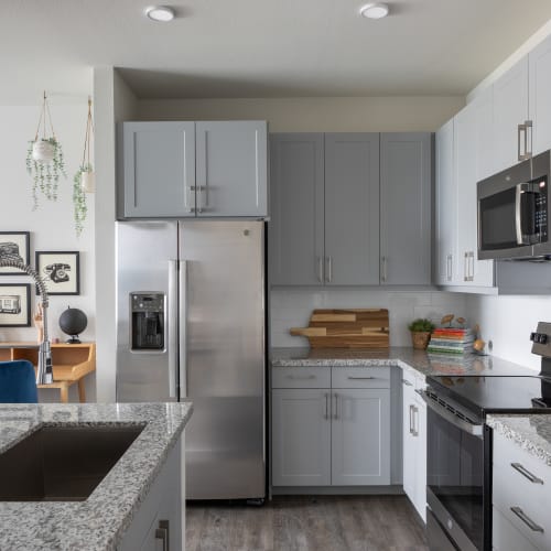 Kitchen with updated appliances at Bellrock Memorial in Houston, Texas