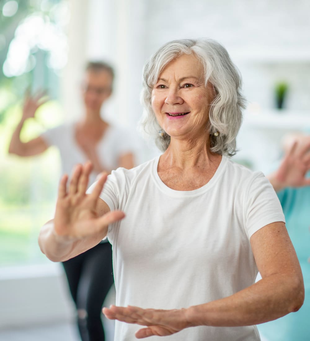Resident taking a Tai Chi class at WellQuest of Elk Grove in Elk Grove, California