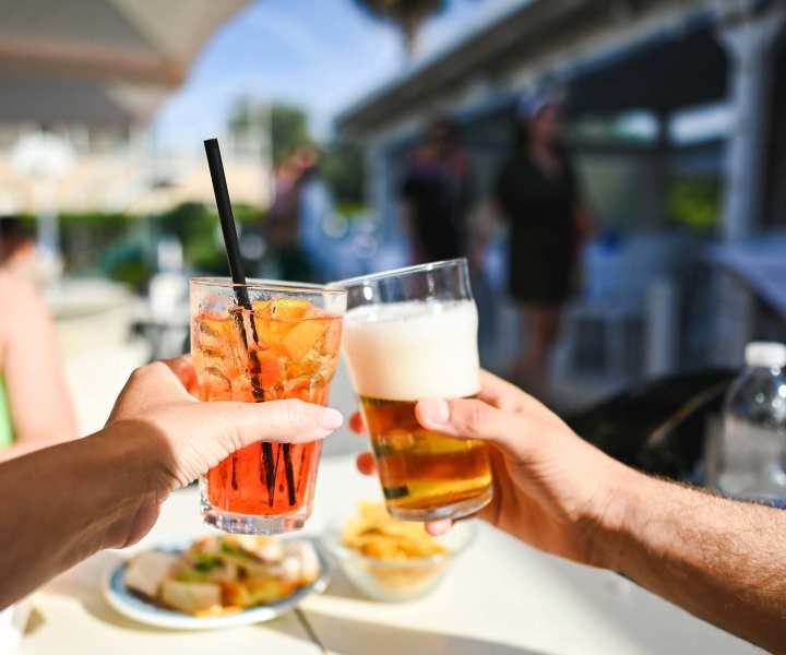 Residents having drinks near El Cid Apartments in West Palm Beach, Florida
