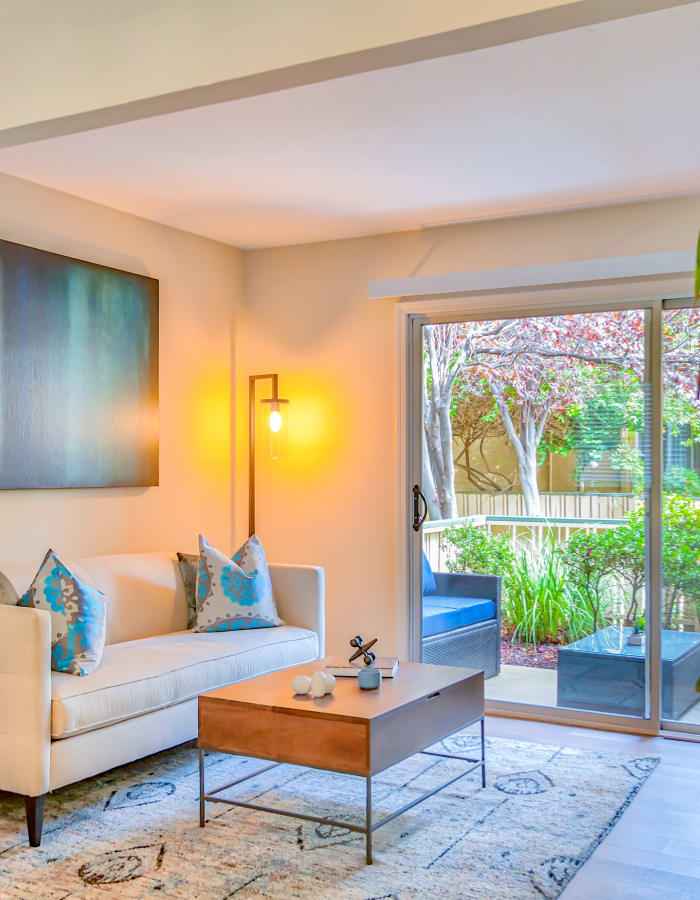 Living Room and Patio at Greenpointe Apartment Homes in Santa Clara, California