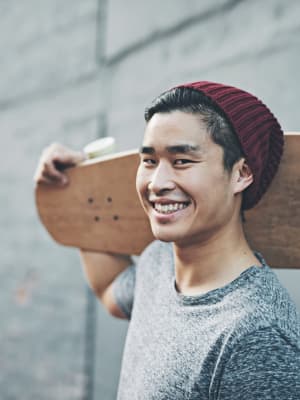 A man skateboarding to work from his apartment at Radiate in Redmond, Washington