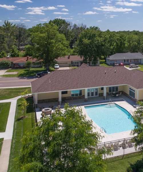 Friends cheers for better future at Heather Ridge Apartments in Columbia, Missouri