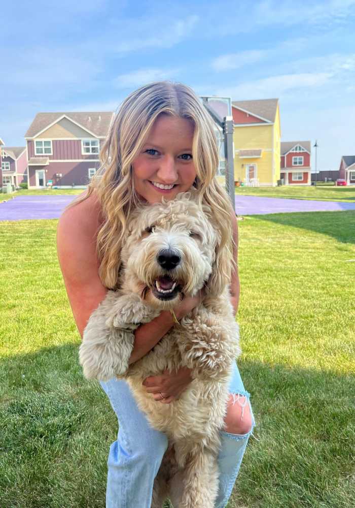 Resident with her dog at College Town Mankato in Mankato, Minnesota