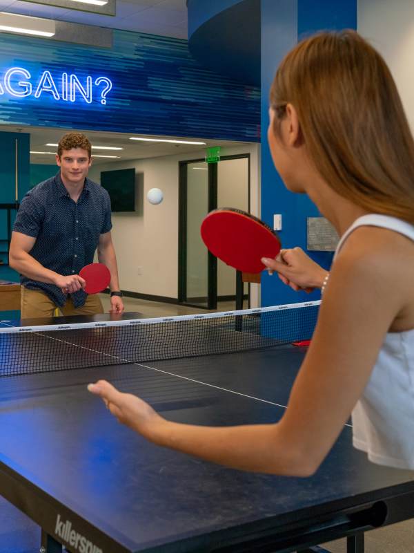 Students playing ping-pong at The Bryn in State College, Pennsylvania