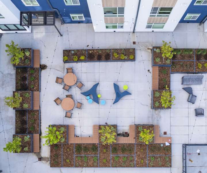 Community rooftop courtyard at The Rose on Colfax in Denver, Colorado