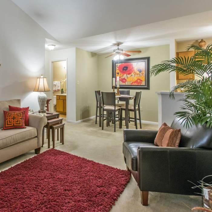 Model unit showing living room and dining room furnished at Marks Church Commons in Augusta, Georgia