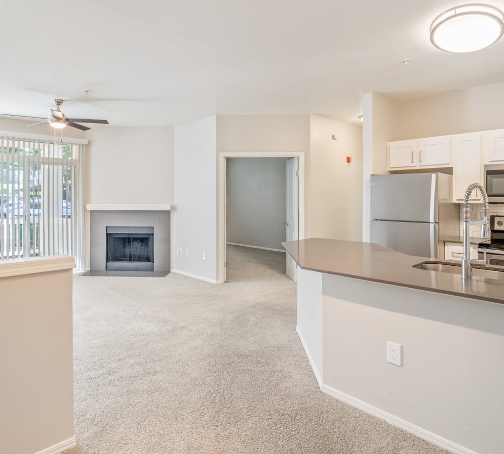 Kitchen with stainless-steal appliances at Center Pointe Apartment Homes in Beaverton, Oregon
