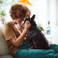 Woman with her dog at Hancock Terrace in Santa Maria, California