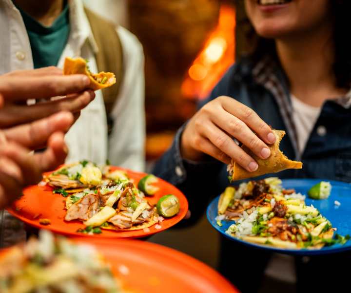 Residents enjoying food at a restaurant near Clipper Cove Apartments in Boynton Beach, Florida