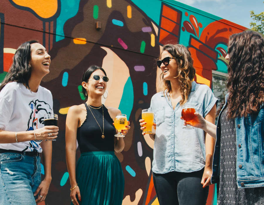 Residents enjoying their drinks near The Brighton in Houston, Texas