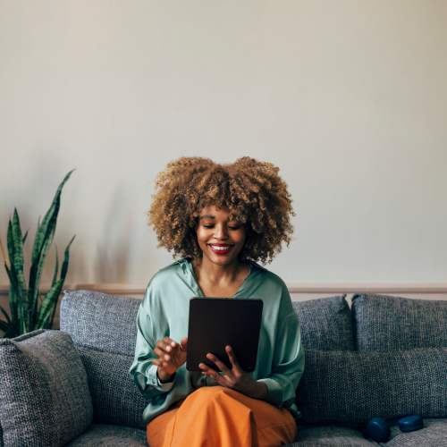 Happy resident at Riverwood Apartments in Reno, Nevada