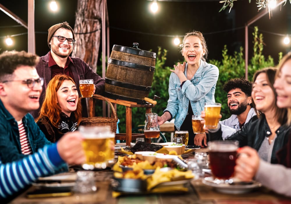 A group of friends enjoying drinks near Woodstream Townhomes in Rocklin, California