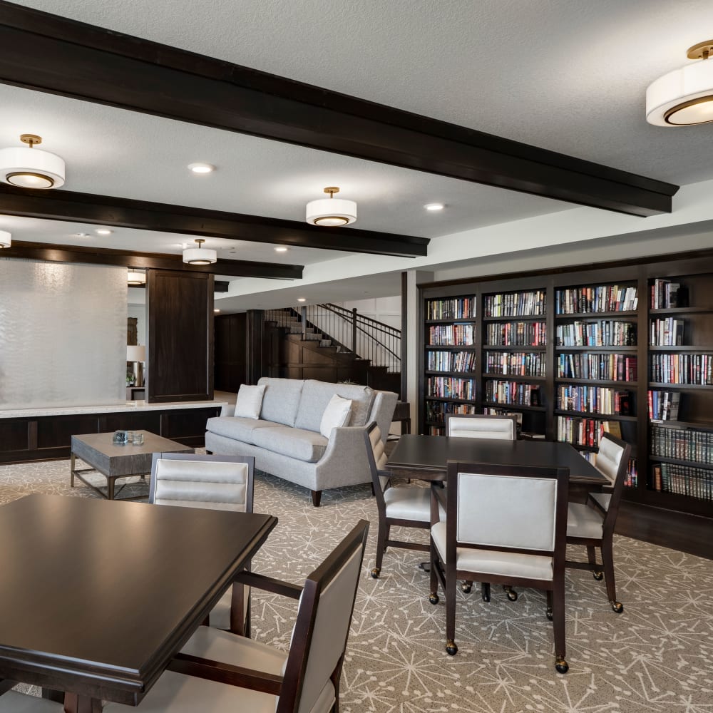 Resident library at Applewood Pointe of Maple Grove at Arbor Lakes in Maple Grove, Minnesota. 