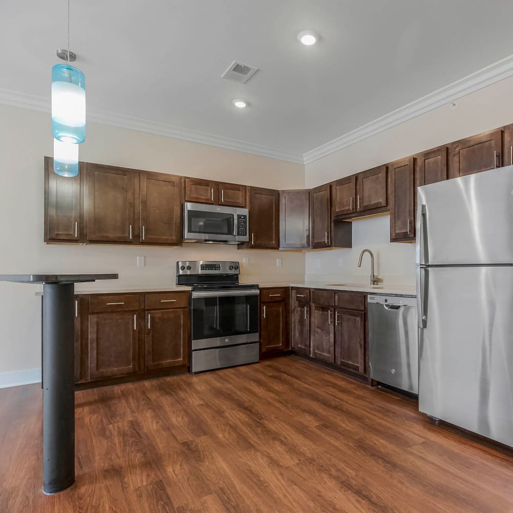 Gourmet kitchen with cabinets and appliances at CityView in North Kansas City, Missouri