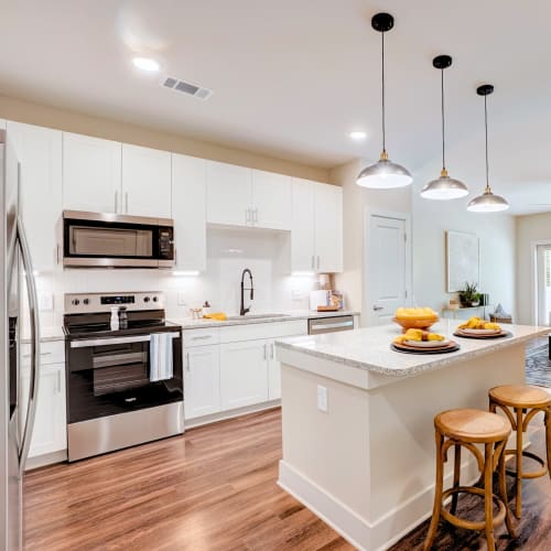 Kitchen with island at The Mallory in Raleigh, North Carolina