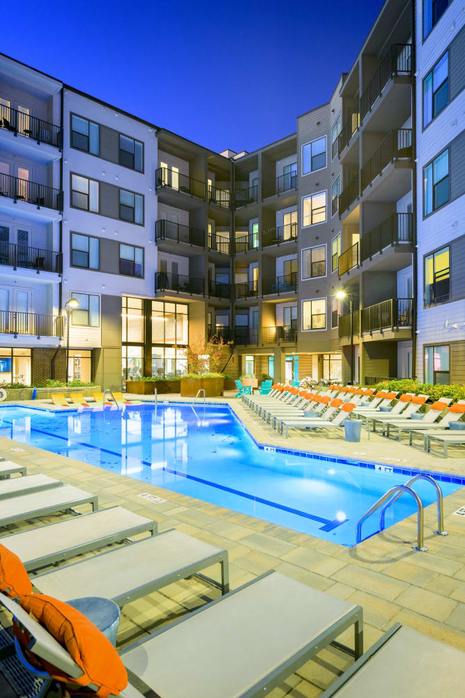 Resort-style pool at night at Marq Music Row in Nashville, Tennessee
